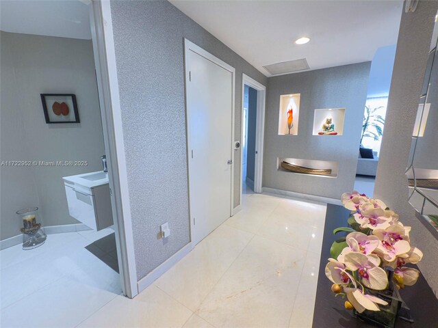 17111 Biscayne Blvd Unit 1705, North Miami Beach, FL 33160 - corridor with tile patterned floors