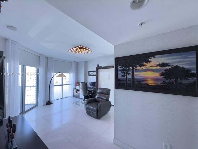 living area featuring light tile patterned floors