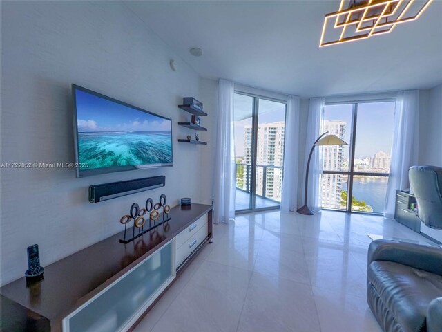 tiled living room featuring expansive windows