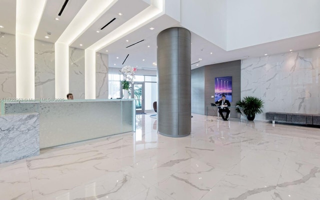 17111 Biscayne Blvd Unit 1705, North Miami Beach, FL 33160 - reception featuring recessed lighting and a wall of windows