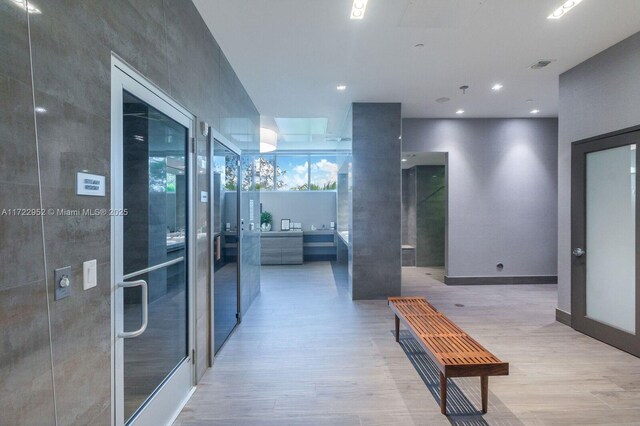 17111 Biscayne Blvd Unit 1705, North Miami Beach, FL 33160 - hall featuring wood finished floors and recessed lighting