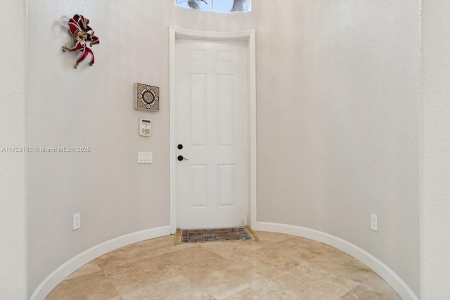 interior space with baseboards