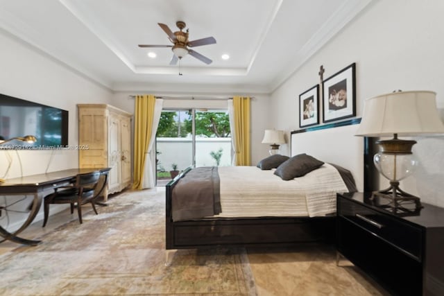 bedroom featuring a tray ceiling and recessed lighting