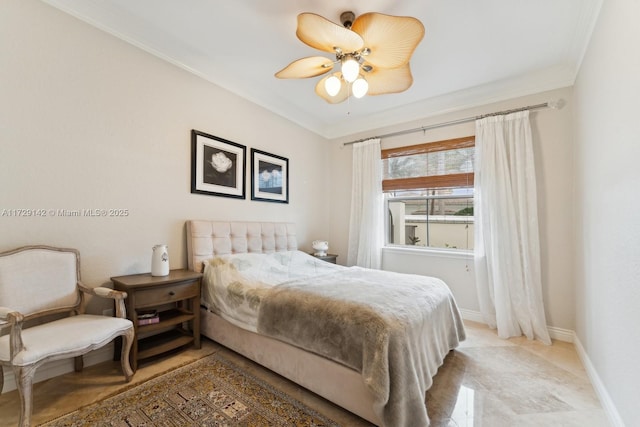 bedroom featuring ornamental molding, baseboards, and a ceiling fan