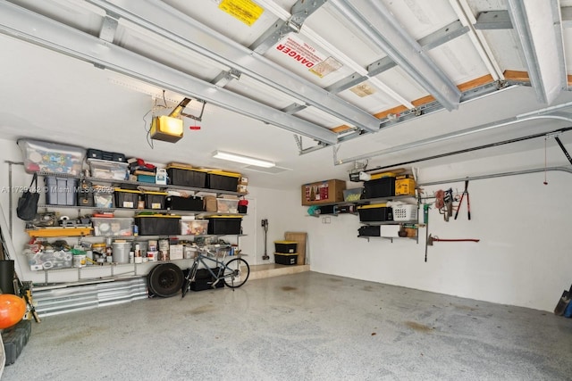 garage featuring a garage door opener