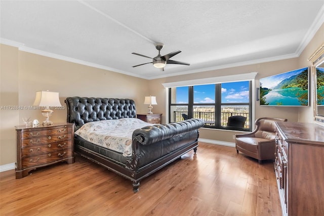 bedroom with crown molding, wood-type flooring, a textured ceiling, and ceiling fan