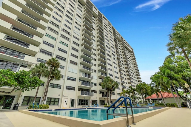 view of swimming pool with a patio area