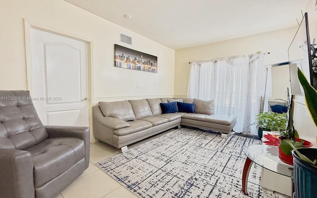 living room with light tile patterned floors