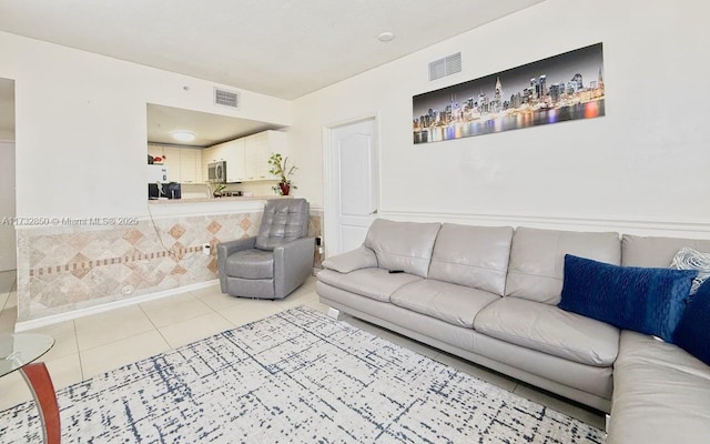 living room featuring light tile patterned floors