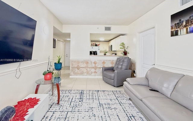 living room with light tile patterned floors