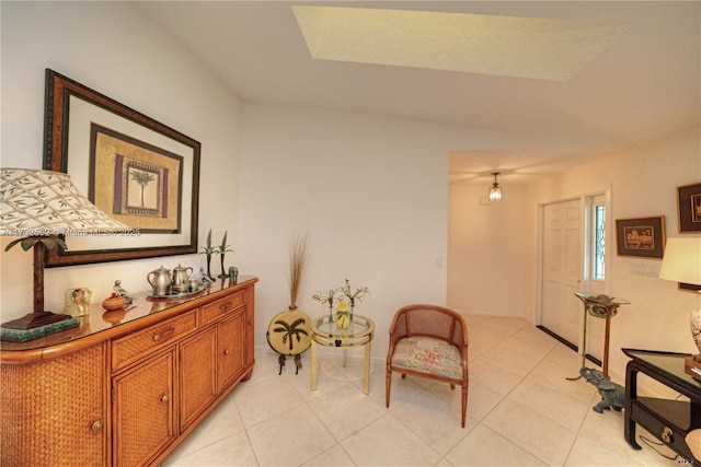 sitting room with light tile patterned floors