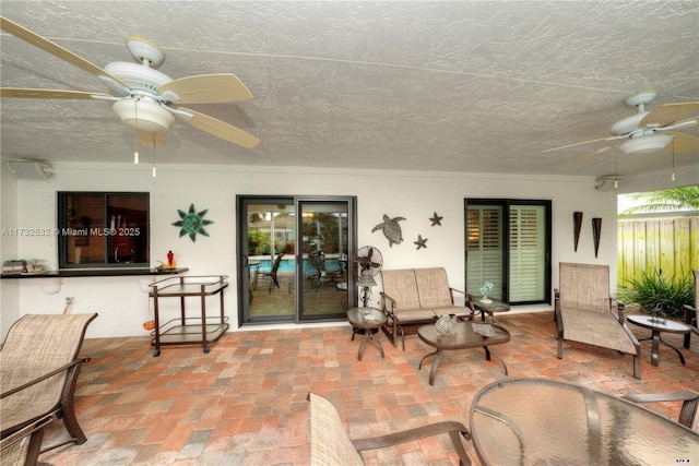 view of patio / terrace featuring ceiling fan