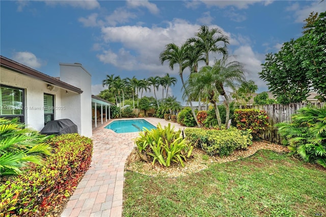 view of pool featuring a patio area