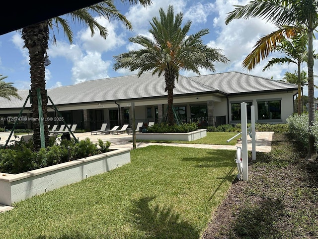 exterior space with a yard and a patio