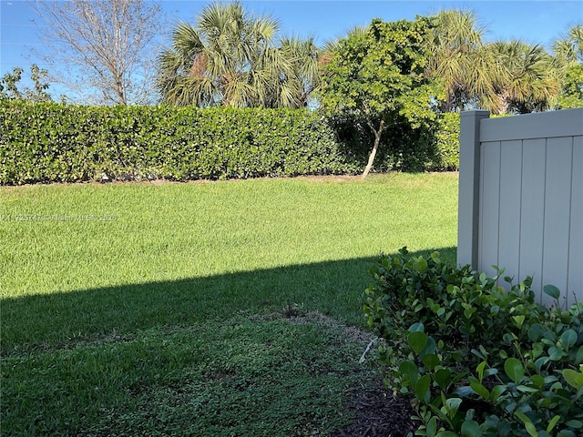 view of yard featuring fence