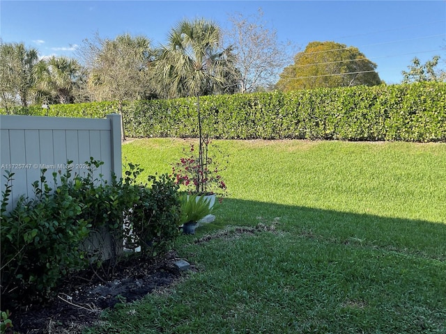 view of yard featuring fence