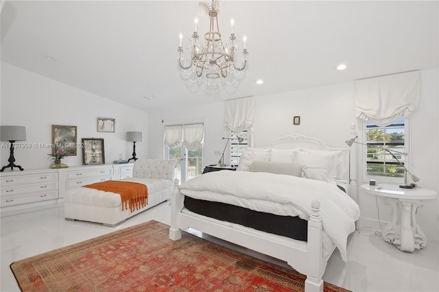 bedroom with vaulted ceiling and multiple windows