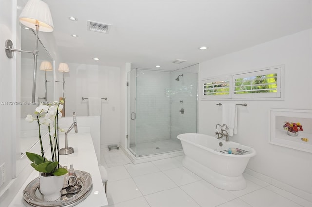 bathroom featuring tile patterned floors and plus walk in shower