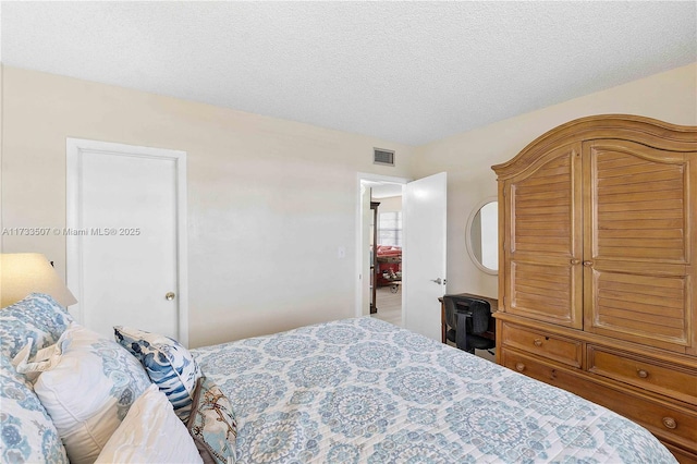 2751 E Golf Blvd Unit 2029, Pompano Beach, FL 33064 - bedroom with a textured ceiling