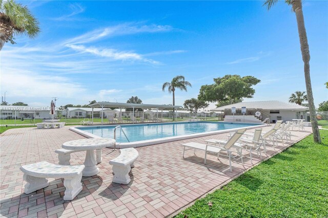 2751 E Golf Blvd Unit 2029, Pompano Beach, FL 33064 - community pool with fence and a patio
