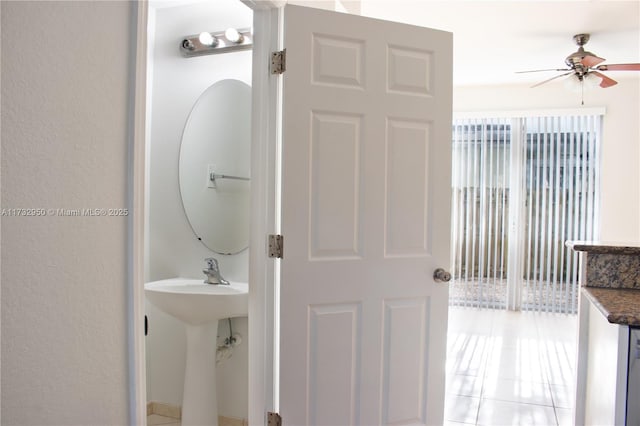 bathroom featuring ceiling fan