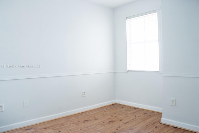 empty room featuring light hardwood / wood-style floors