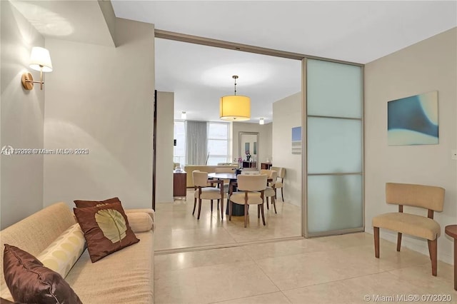 living room with light tile patterned floors