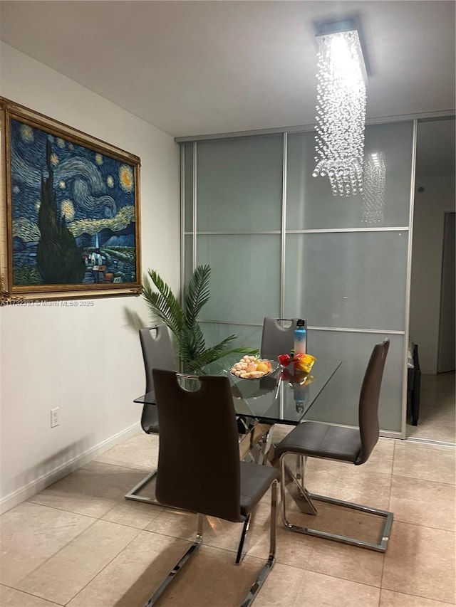 tiled dining area with baseboards