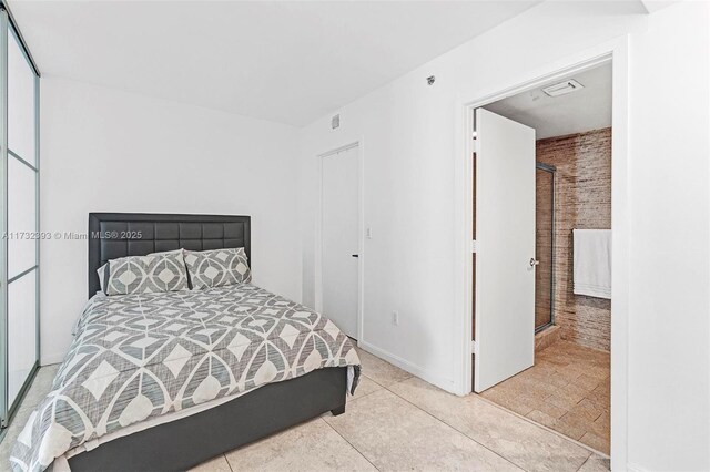50 Biscayne Blvd Unit 601, Miami, FL 33132 - bedroom featuring tile patterned flooring