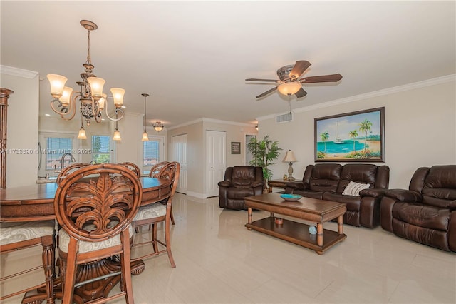 living room with crown molding, ceiling fan with notable chandelier, and light tile patterned floors