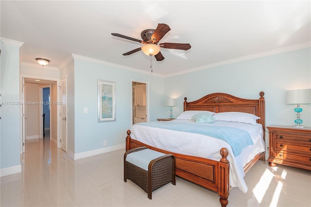 bedroom featuring ornamental molding, ensuite bathroom, and ceiling fan