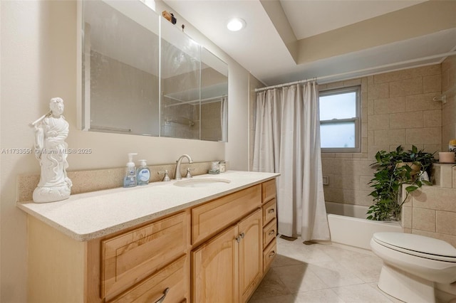 full bathroom featuring shower / tub combo, vanity, tile patterned flooring, and toilet