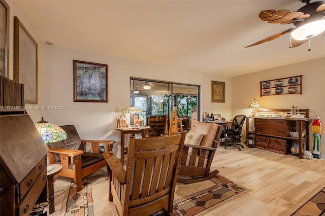 interior space with ceiling fan and light wood-type flooring