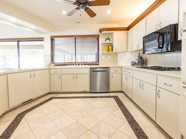 kitchen with sink, backsplash, plenty of natural light, and stainless steel appliances