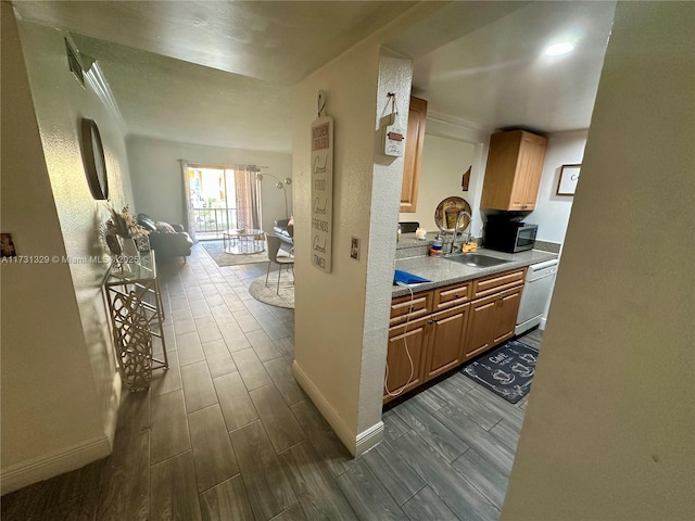 kitchen with white dishwasher and sink