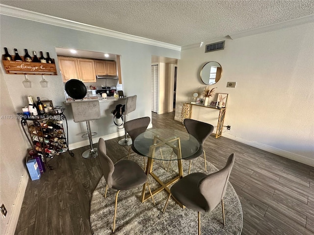 17911 NW 68th Ave Unit M106, Hialeah, FL 33015 - dining area featuring crown molding, dark hardwood / wood-style floors, and a textured ceiling