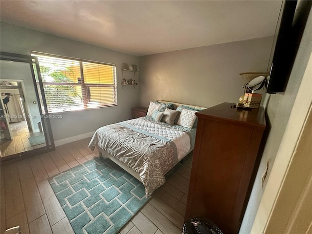 bedroom featuring hardwood / wood-style floors