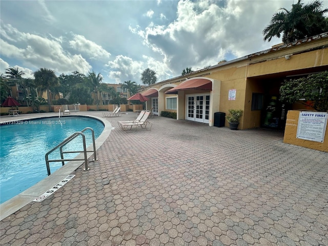 view of pool featuring a patio area