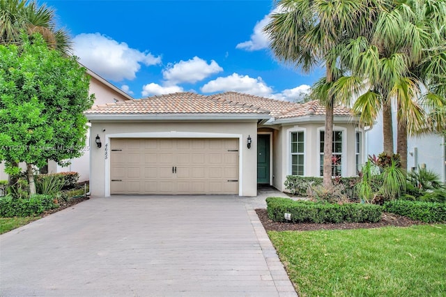 mediterranean / spanish-style house featuring a garage