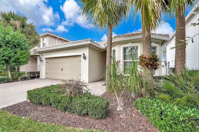 view of front of home with a garage