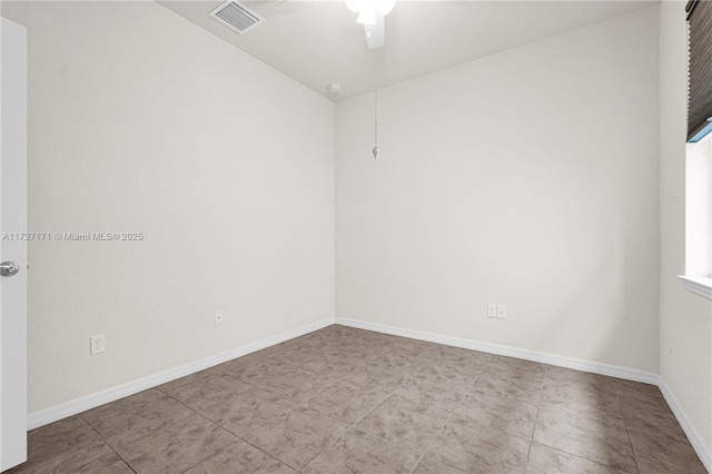 empty room featuring ceiling fan