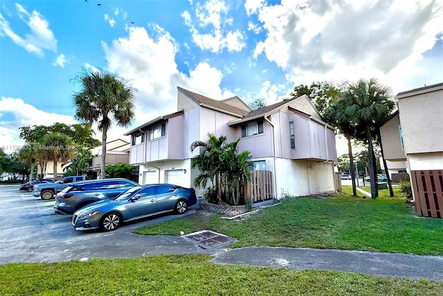 view of side of home featuring a yard