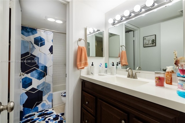 full bathroom with vanity, shower / tub combo with curtain, tile patterned floors, and toilet