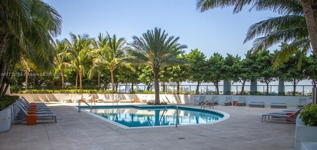 view of swimming pool featuring a patio