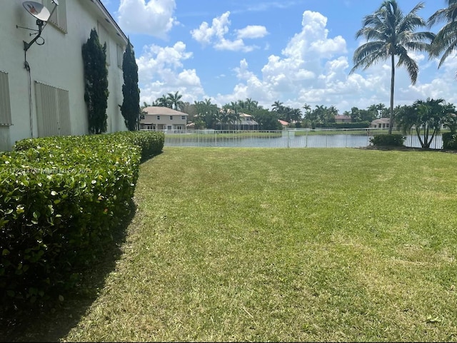 view of yard with a water view