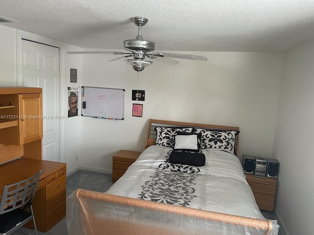 bedroom with a textured ceiling, a closet, and ceiling fan