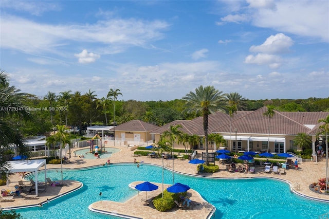 view of swimming pool featuring a patio