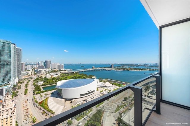 balcony featuring a water view