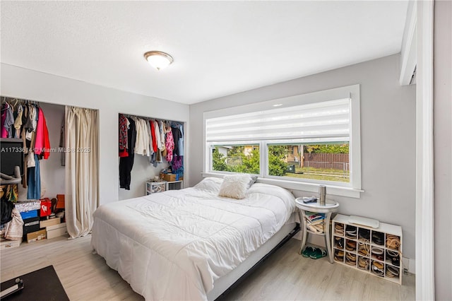 bedroom featuring wood finished floors