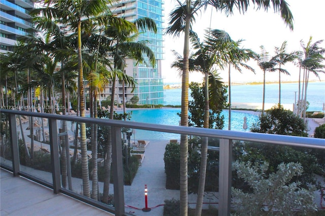 balcony featuring a water view